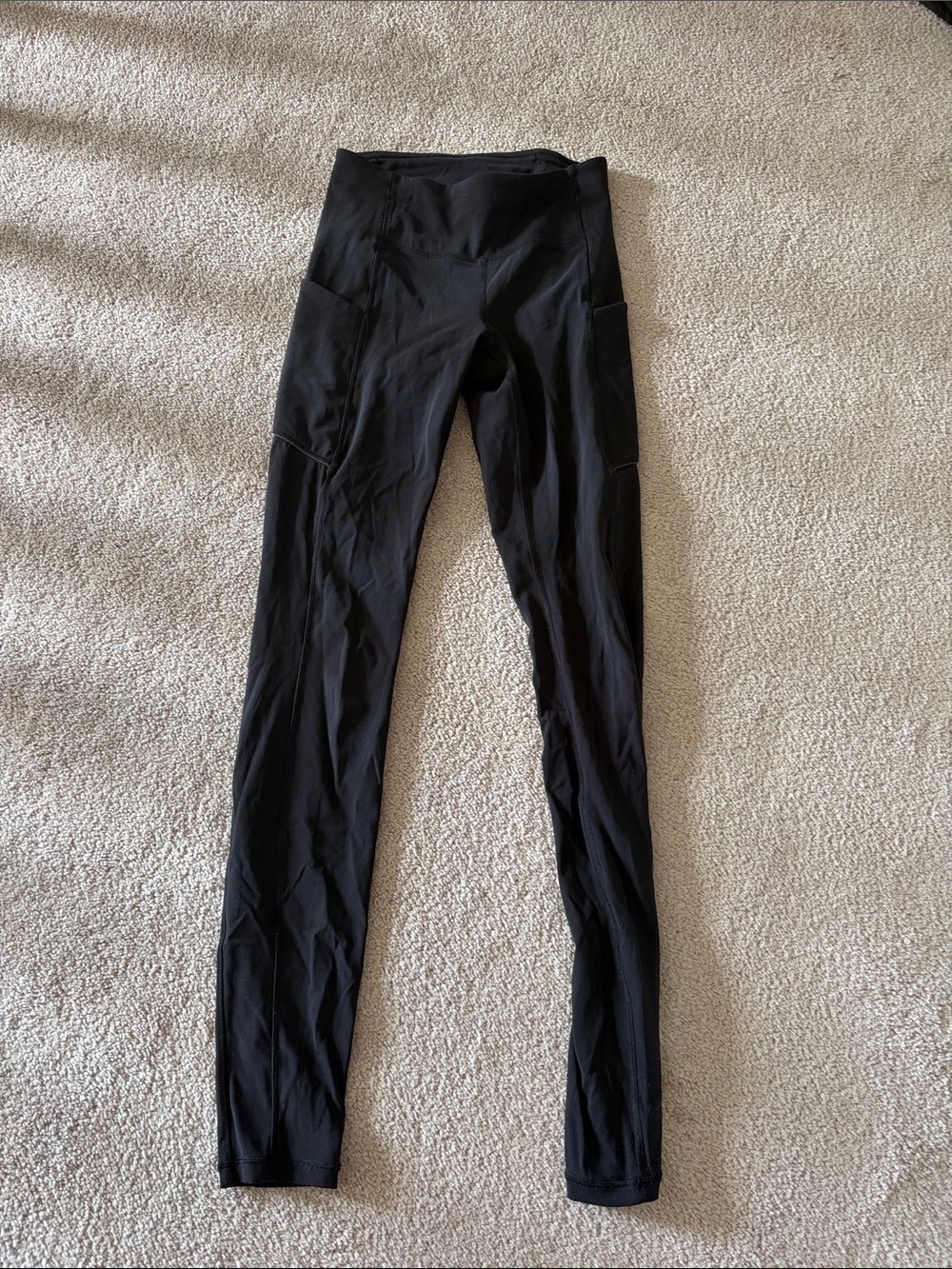 Lululemon black mid rise leggings with pockets!!